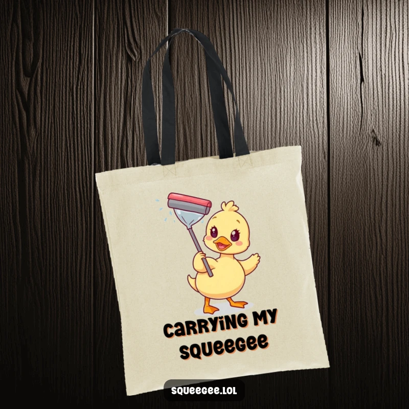 Funny tote bag showing a happy duck wiping a sparkling window with a squeegee, perfect for carrying items with a touch of clean humor.